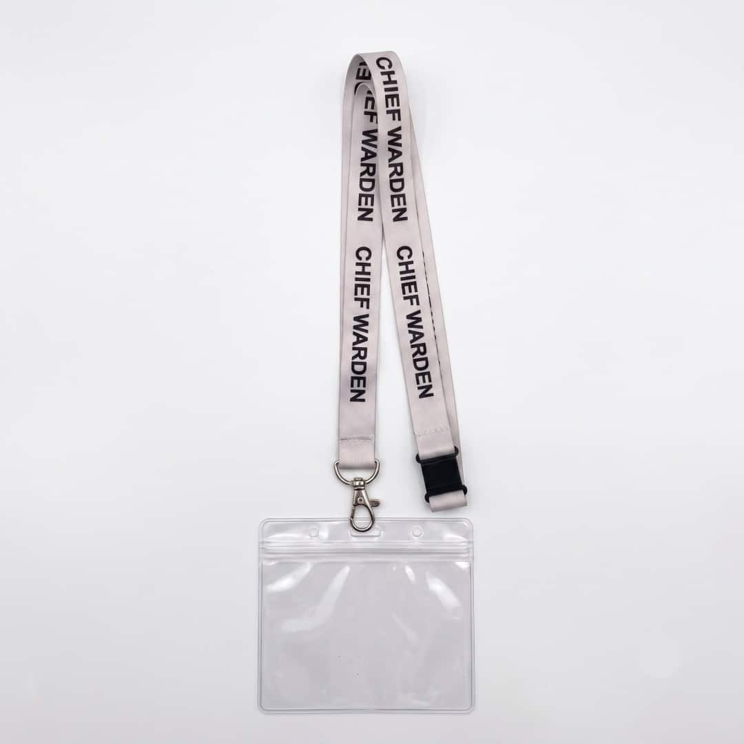 White Chief Warden lanyard attached to clear plastic horizontal ID badge pouch