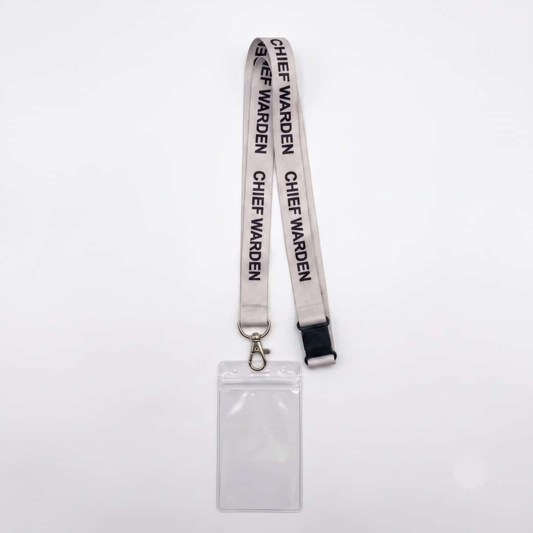 White Chief Warden lanyard attached to clear plastic vertical ID badge pouch